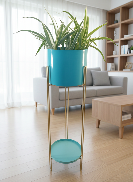 Turquoise planter with a plant on a gold stand in a living room setting.