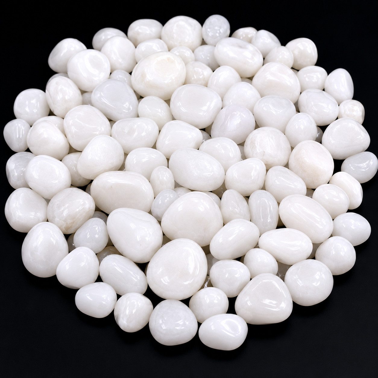 White pebbles on a black background