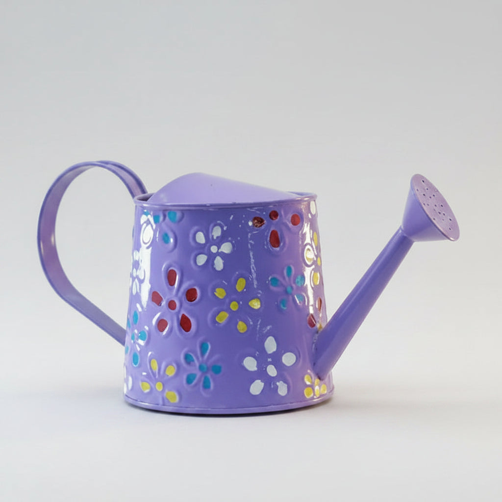 Purple watering can with floral patterns on a white background