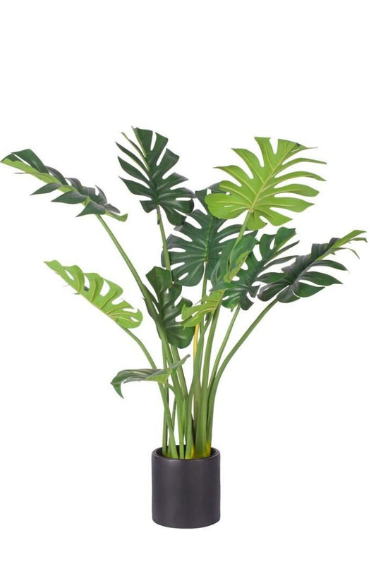 Artificial potted plant with green leaves on a white background