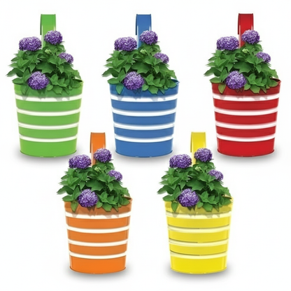 Set of six colorful striped planters with plants on a white background