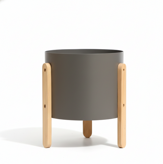 Gray planter with wooden legs on a white background