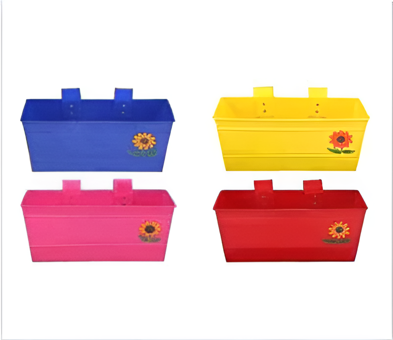 Four colorful metal planters with sunflower design on a white background