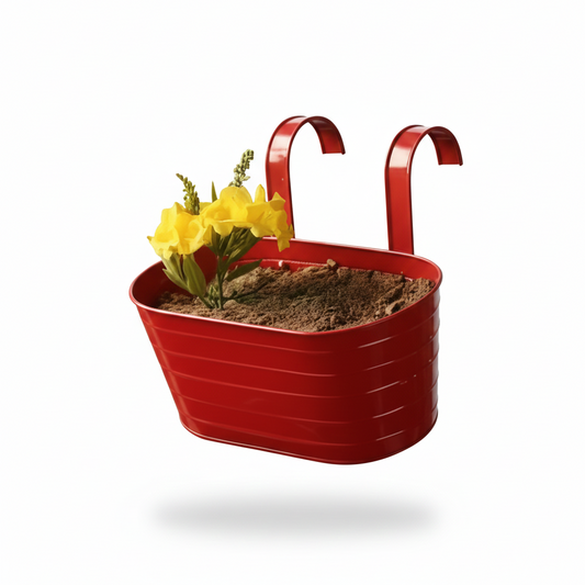 Red metal wall planter with yellow flowers on a white background
