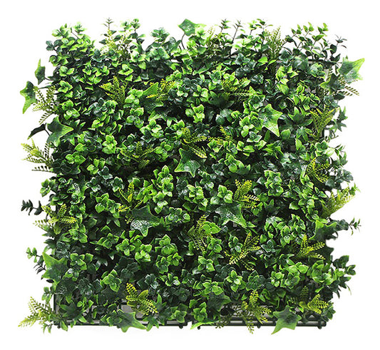 Artificial green wall panel with leafy texture on a white background