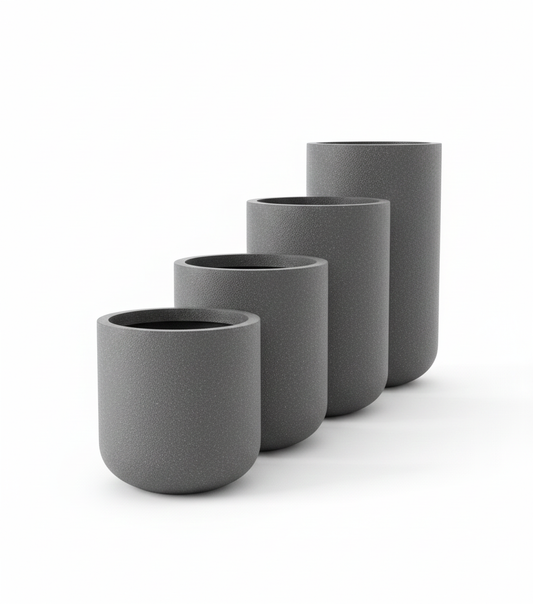 Set of four gray ceramic planters of different sizes on a white background
