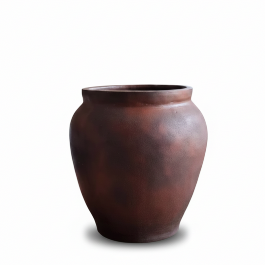 Brown ceramic vase on a white background
