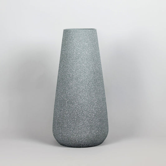 Gray textured vase on a light gray background