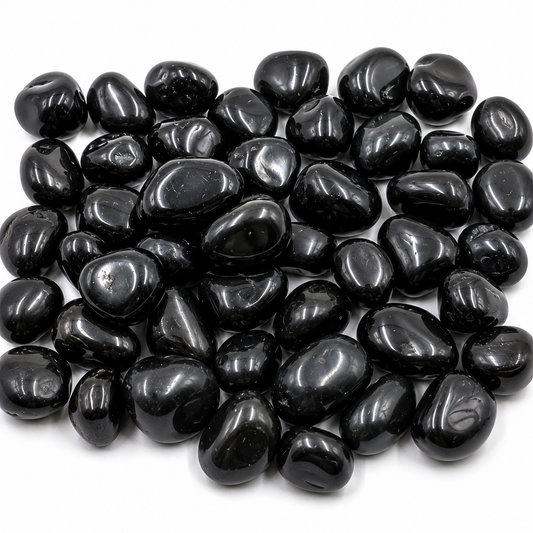 Black pebbles on a white background