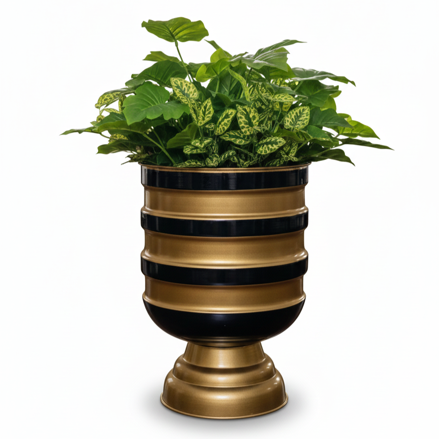 Decorative planter with striped design and green plants on a white background