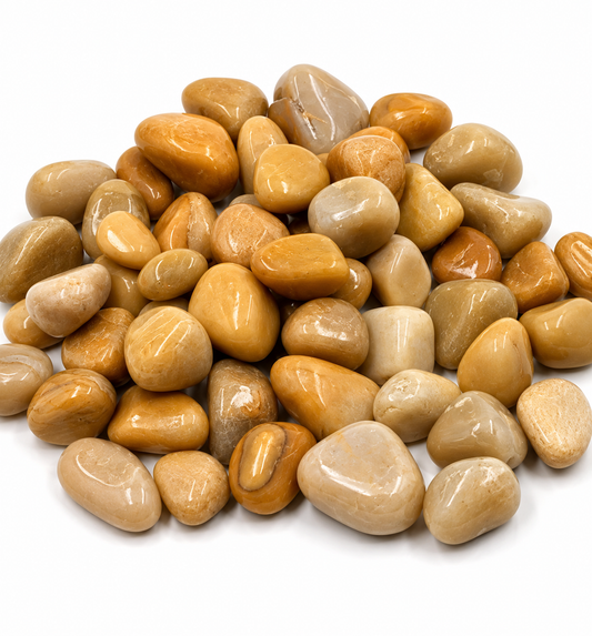 Pile of polished pebbles on a white background