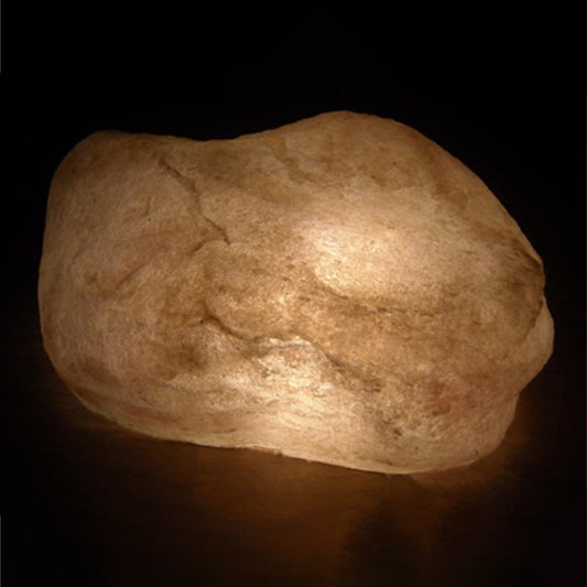 Light brown stone on a dark background